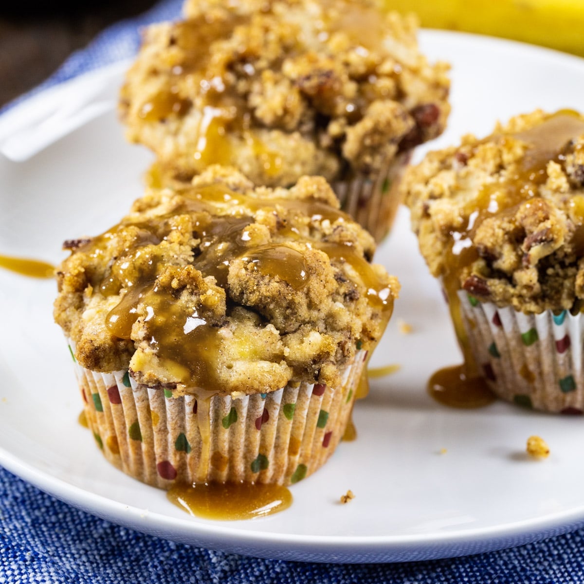 Rum-Soaked Bananas Foster Muffins with Crunchy Pecan Streusel